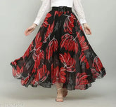 Black Georgette skirt with red jesmin print, featuring a printed net pattern. Women's size 28/28in-34in