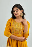 Yellow embroidered viscose rayon Anarkali Kurta, beautifully crafted with lace work and perfect for party, wedding, or festive wear. Available in size S-XXXXL. Made in India