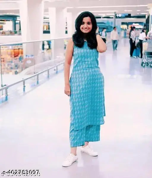 Sleeveless cotton kurta set with palazzos, printed net design. Women's Indian wear in sizes M-XXL