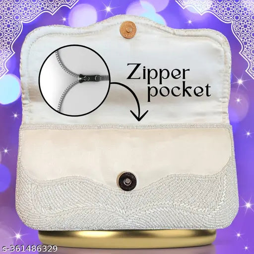 White beaded fancy fabric clutch purse, embroidered net design, spacious interior compartment. Indian-origin handmade designer women's accessory