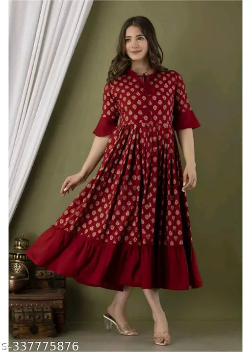 Stylish maroon rayon anarkali kurti, printed combo, three-quarter sleeves. Perfect for dinner parties or family gatherings, India