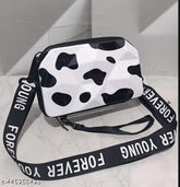 Black-and-white acrylic sling bag with detachable shoulder strap, convertible into cosmetic box. Rainbow printed net design, free size (7x3x5 inches). Elevate your style on-the-go