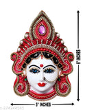 Hand-decorated red plastic Maa Lakshmi Face God Idol - Indian Goddess of wealth and prosperity for worship during Marghshish month or any time. Approx. dimensions: 15 x 13 x 4 cm, weight: 100 grams
