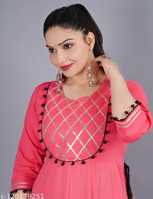 Stylish rayon Gazari Anarkali gown with yoke work, three-quarter sleeves, solid pattern. Women's fashion accessory