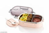 Peach-colored 1100ml stainless steel thermoware lunch pack with spill-proof body and airtight lid, ideal for school, office, or travel, suitable for snacks, fruits, rotisabzi rice dishes, and leftovers, reusable and durable, food safe and healthy, BPA free, made in India