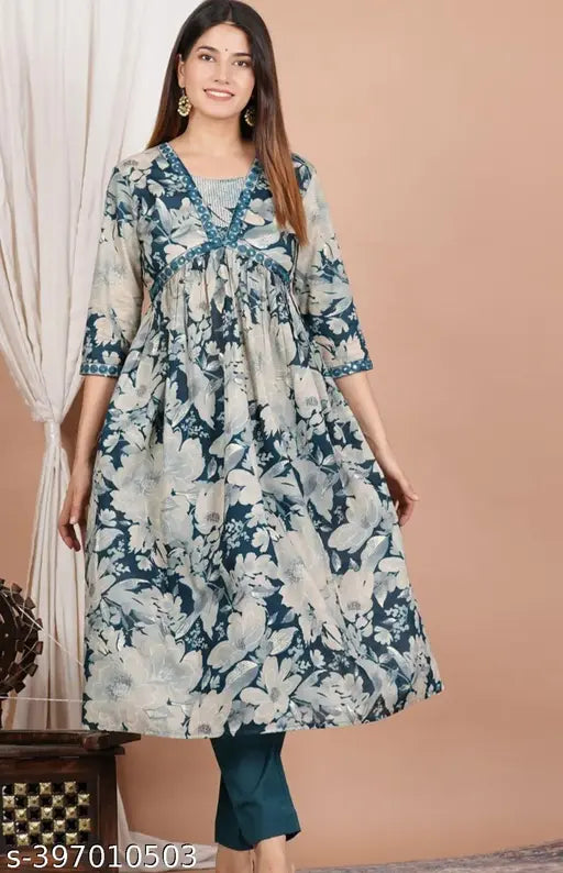 Aqua blue rayon Aliya cut procion kurti with three-quarter sleeves and printed pattern, embroidered for Indian women's fashion