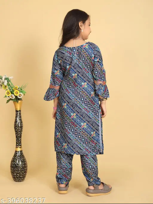 Vibrant yellow Kora Muslin kurta with Sharara dupatta set for girls, traditional ethnic wear, trendy design, India