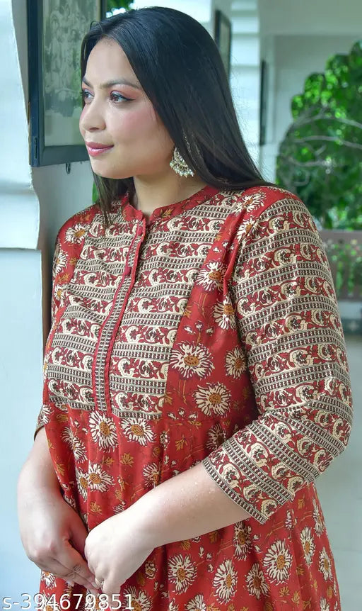 Red cotton women's floral round kurti with three-quarter sleeves, printed design, mandarin collar, and yoke design. Indian made, 48 inches in length