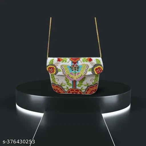 Handmade fabric designer clutch, embroidered net pattern, women's beaded purse for parties - India origin