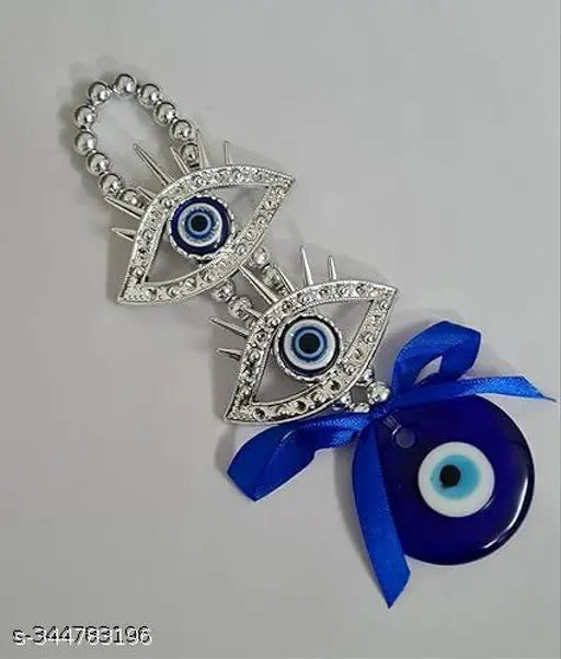 Turkish silver-blue plastic God's Eye Feng Shui wall hanging, enhancing harmony, peace, and prosperity. Blue evil eye amulet for protection and inner strength. Hang near entrances or anywhere for divine energy and good luck