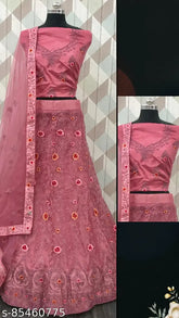 Pink net semi-stitched Lehenga Choli with detailed embroidery - Perfect for festive celebrations, parties, and special events in India