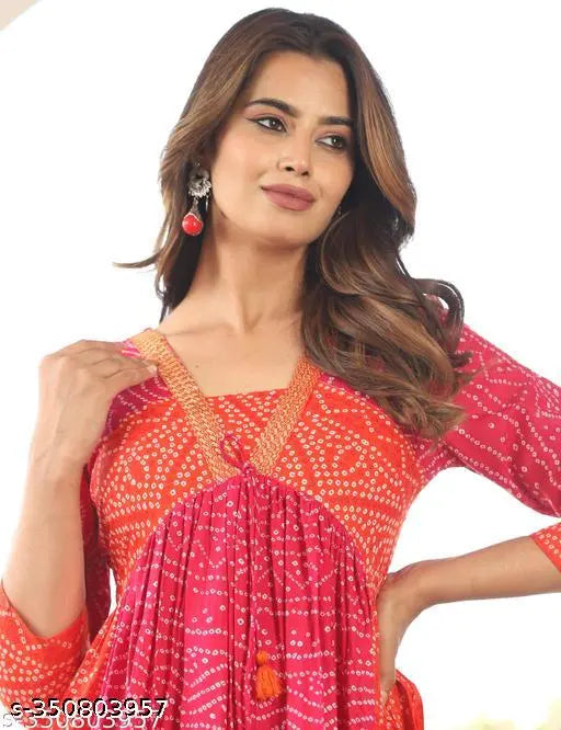 Alya pink rayon three-quarter sleeve kurta with dyed/washed bendaj print, suitable for S to XXL bust sizes