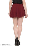 Polycotton stretch skater skirt with inner shorts and flared inskirt. High waistband, A-line silhouette, laser cutout scallop hem. Wide waist sizes available (26-36), dry clean only