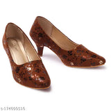 Stylish synthetic leather printed pencil heel pumps for women and girls, anti-skid, trending footwear on display