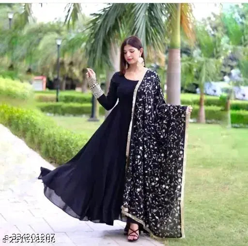 Stylish black embroidery work gown dupatta set on mannequin, Georgette fabric with long sleeves and intricate net pattern. Indian bridal or formal wear accessory, available in sizes S-XXL