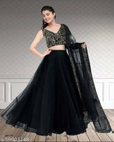 Black velvet semi-stitched lehenga choli set with golden dupatta, featuring sequin work and net fabric, suitable for parties and weddings