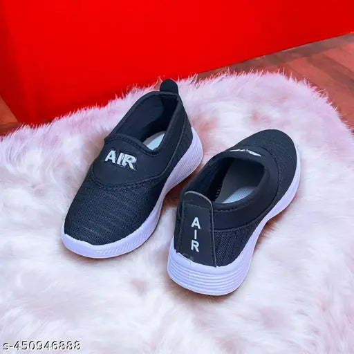 Black EVA slip-on kids' shoes for daily wear and parties, ideal for boys aged 2-4 years, featuring perforations for breathability