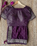 Wine-colored vichitra silk saree with stitched satin blouse, embellished net pattern, ready for Indian wedding wear or parties