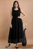 Black rayon embroidered kurti with three-quarter sleeves. Indian printed black jacket kurti