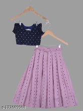 Kids traditional cotton silk lehenga choli set for girls with short sleeves and printed design on display