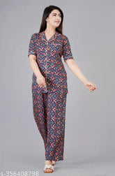 Women's printed rayon blue night suit set, art silk top and rayon bottom, short-sleeved, printed pattern on display