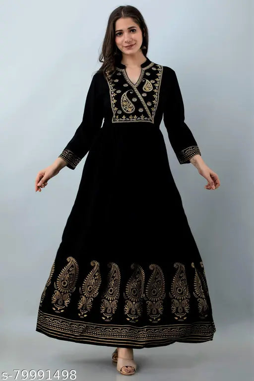 Black embroidered rayon Aline kurti, three-quarter sleeves, zari work yoke, foil print hem - elegant Indian fashion accessory