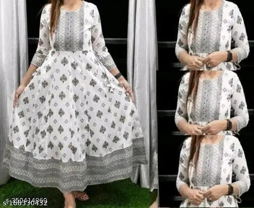 White gold print rayon Anarkali kurti, three-quarter sleeves, vibrant pattern, fashionable women's clothing accessory on hanger