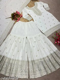 Trendy silk Sharara set with embroidered net kurta, three-quarter sleeves, and matching gharara bottom. Indian handcrafted garments in sizes M, L, XL, XXL (fully stitched ready to wear). Embellished dupatta included