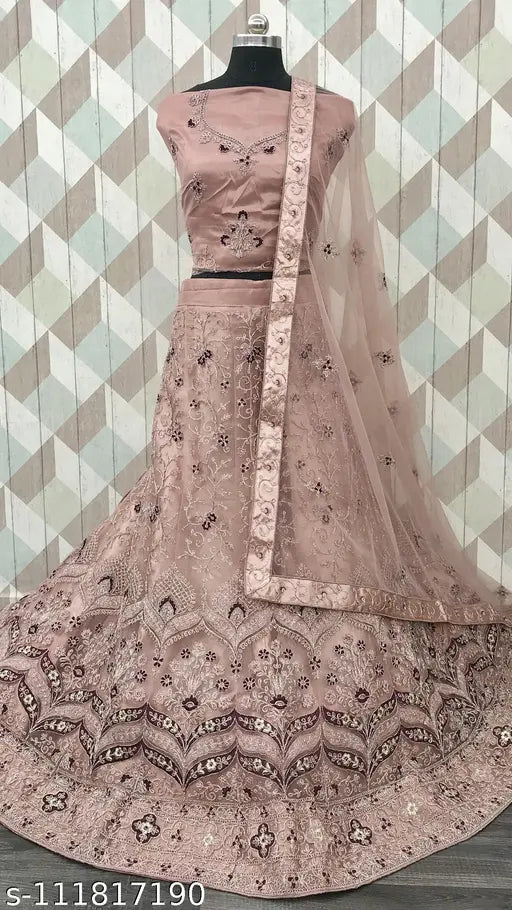 Embroidered net lavender lehenga choli set, 2.5m dupatta and semi-stitched blouse. Popular choice for traditional occasions, festivals, or gifts. High-quality Indian designer embroidery work