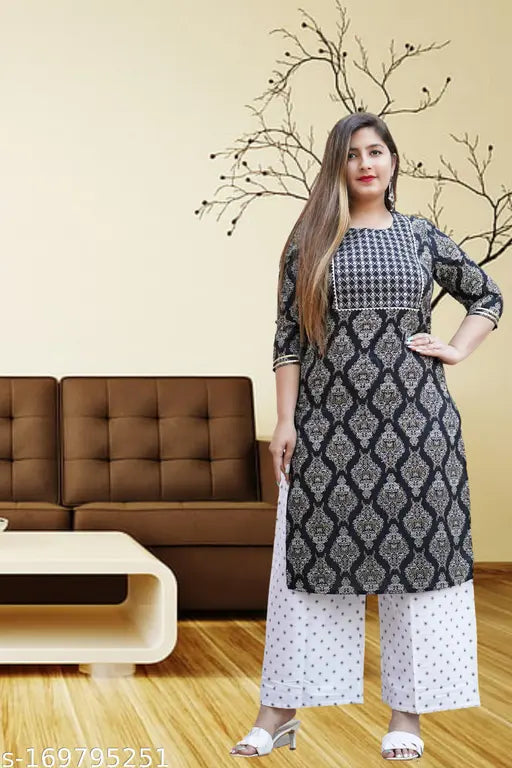 Multicolor printed cotton kurta and palazzo set for party, wedding, office, and casual wear. Three-quarter sleeve design, round neckline, and ankle length