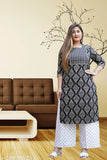 Multicolor printed cotton kurta and palazzo set for party, wedding, office, and casual wear. Three-quarter sleeve design, round neckline, and ankle length
