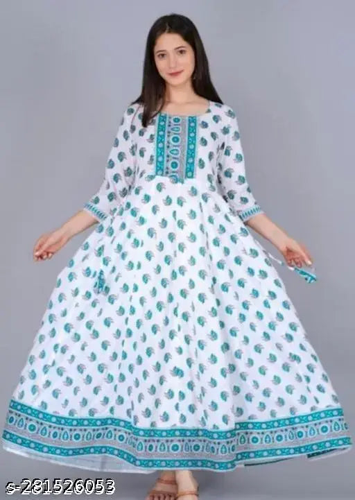 White viscose rayon anarkali with printed combo, three-quarter sleeve length. Women's fashion garment on mannequin