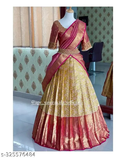Yellow striped semi-stitched Lehenga Choli in soft silk, embellished with zari work; floral jacquard dupatta, ideal for Navratri, marriage, or formal events