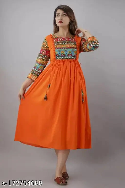 Orange rayon Anarkali printed kurta with three-quarter sleeves, suitable for work or festive wear. Made in India from a 100% natural rayon fabric