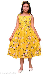 Yellow printed flower knee-length kids party wear dress, adorned with floral patterns and sleeveless. Perfect for every occasion, made from crepe fabric in sizes 8-12 years