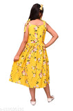 Yellow printed flower knee-length kids party wear dress, perfect for every occasion combo. Made from crepe fabric with sleeveless design and round neckline. Great for girls' parties or everyday wear. Indian origin