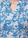 Rayon blue flower tunic with 3/4 sleeves, mandarin collar, and front pleats. Indian-made fashion clothing for size 34
