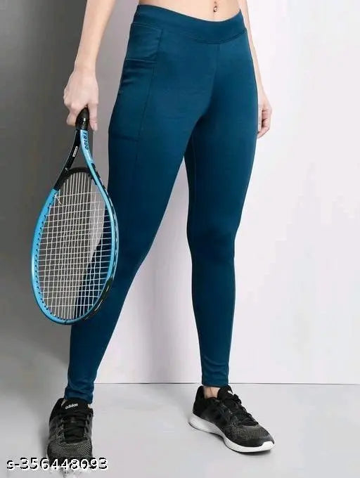 Black solid tights activewear, high-rise leggings for yoga and gym. Made of 90% polyester, 10% spandex. Available in sizes from 28 to 40. Indian brand A.S jeggings