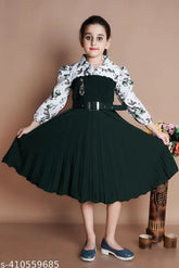 Green crepe party frock for girls with belt, features long sleeves and printed net pattern