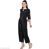 Woman in trendy foil-printed rayon jumpsuit with colorblock design, short sleeves and fitted waist