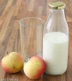 Clear glass water bottles, pack of 12 with airtight leak-proof gold caps, perfect for fridge storage and various liquids like milk or shakes. Made in India