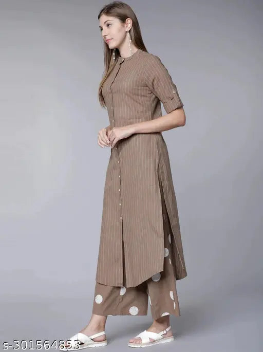 Women's cotton printed kurti pant set with palazzos, three-quarter sleeves, Indian-inspired pattern on display