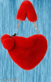 Soft pink faux fur heart-shaped handbag, India-made, single compartment clutch purse with pom poms and pom pom balls for women's stylish everyday wear or warm heart gifts
