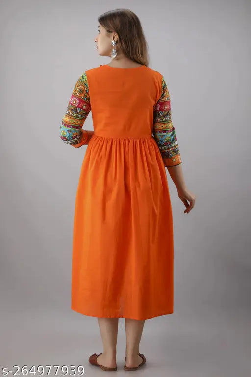 Orange rayon anarkali, trendy women's kurti with three-quarter sleeves. Single solid colored, suitable for casual events & outings. Ideal for pairing with leggings, palazzo, or pants. Lightweight, ensures comfort. Indian-made fashion forward kurti, may slightly vary from screen depiction
