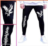 Black print polycotton abstract net garment on hanger, size 30 (waist 30in, length 40in, hip 32in)