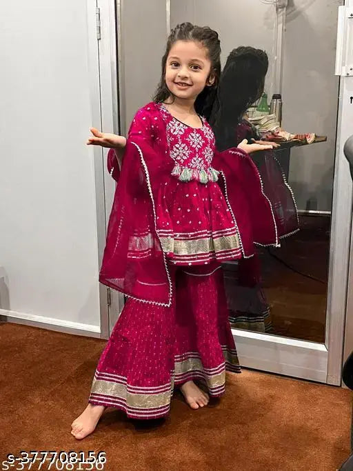 Red pom pom kids sharara set, rayon fabric with organza dupatta, embroidered Indian fashion for children aged 3-12 years on display