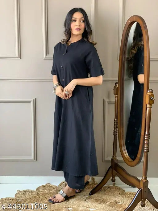Black cotton women's kurta set with palazzos, solid net pattern, short sleeves, Indian origin