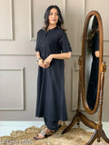 Black cotton women's kurta set with palazzos, solid net pattern, short sleeves, Indian origin