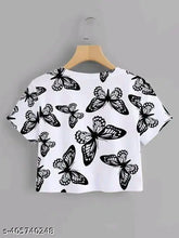Trendy printed crop t-shirt, round neck top for women (polyester/lycra), available in sizes S-XL. Perfect for casual outfits like jeans, leggings, or shorts. Machine washable; wash inside out and dry in shade. Indian origin