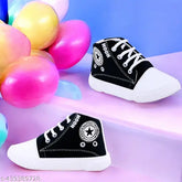 Black canvas and rubber sports sneakers for boys and girls, stylish with colorblocked design, ideal for daily wear, breathable and supportive sole. Comfortable shoes for kids aged 2-12 years. Made in India